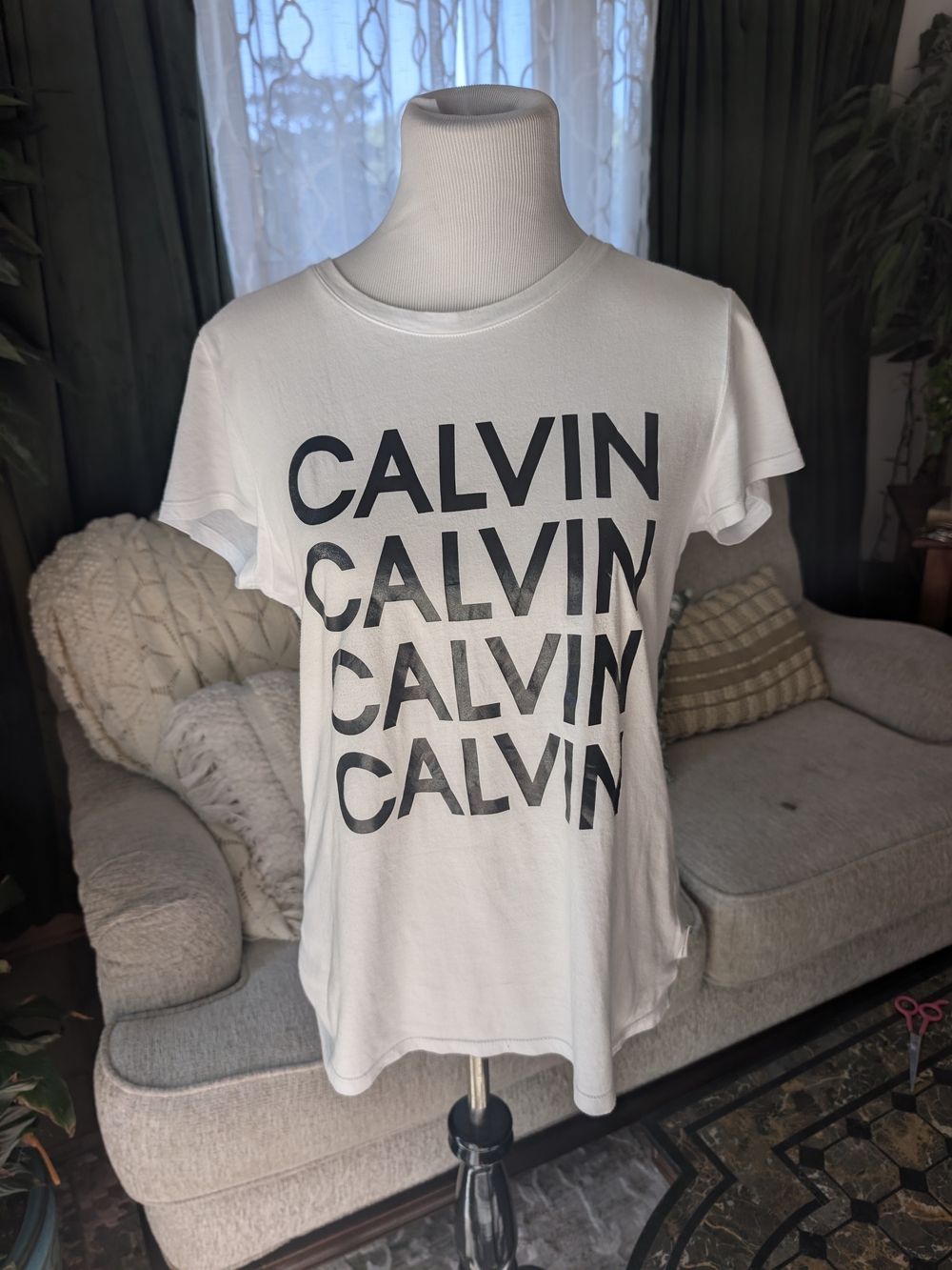 Calvin Klein Jeans White Short-Sleeve Tee with Repeated Black Logo
